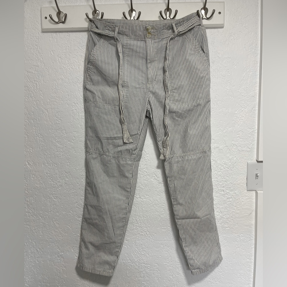 AE PANTS. SIZE 8. BLUE/WHITE STRIPES. POCKETS, ROLL UP ANKLE, STRING BELT.